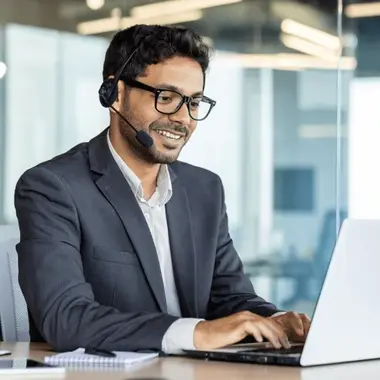cradis-young-successful-man-workplace-headset